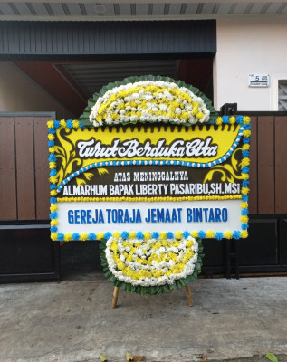 Papan Bunga Duka di Malaka Jaya